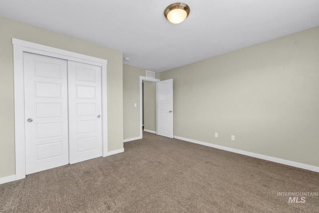 12041 W Ardyce, Boise, ID 83713 - unfurnished bedroom featuring carpet flooring, a closet, and baseboards