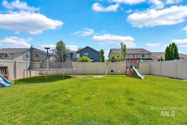 12041 W Ardyce, Boise, ID 83713 - view of yard with a playground, a trampoline, and a residential view