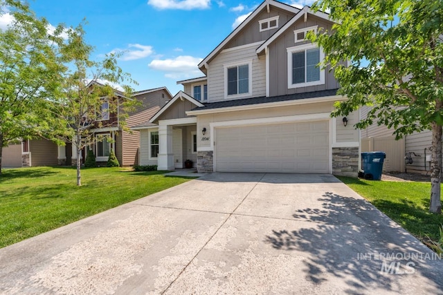 12041 W Ardyce, Boise, ID 83713 - craftsman house with board and batten siding, stone siding, driveway, and a garage