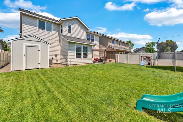12041 W Ardyce, Boise, ID 83713 - back of house with a trampoline, a playground, and a patio area