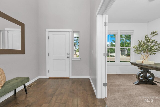 12041 W Ardyce, Boise, ID 83713 - foyer with dark wood-style flooring and baseboards