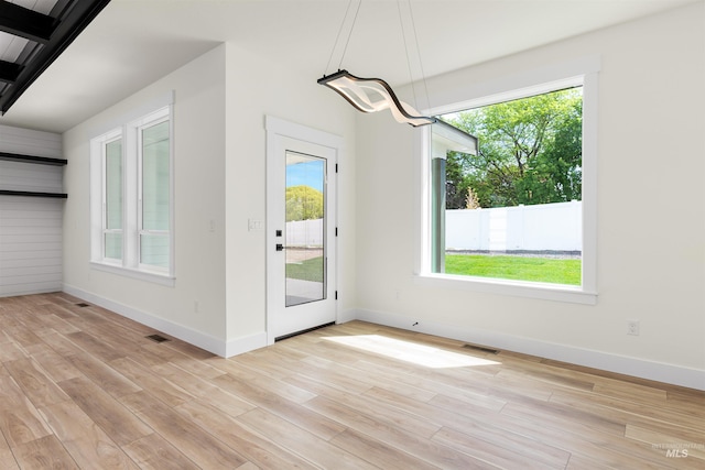 interior space with light hardwood / wood-style floors