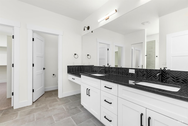 bathroom with backsplash and vanity