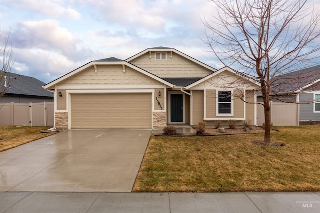 craftsman-style house with a front lawn and a garage