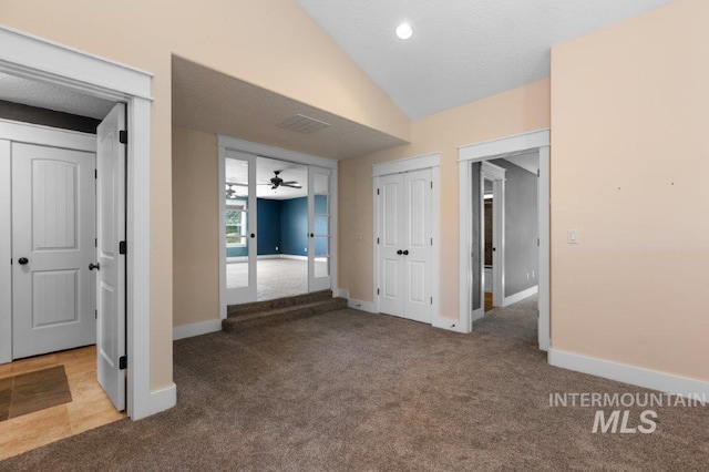 2600 W S Slope Rd, Emmett, ID 83617 - unfurnished bedroom featuring carpet, baseboards, and vaulted ceiling
