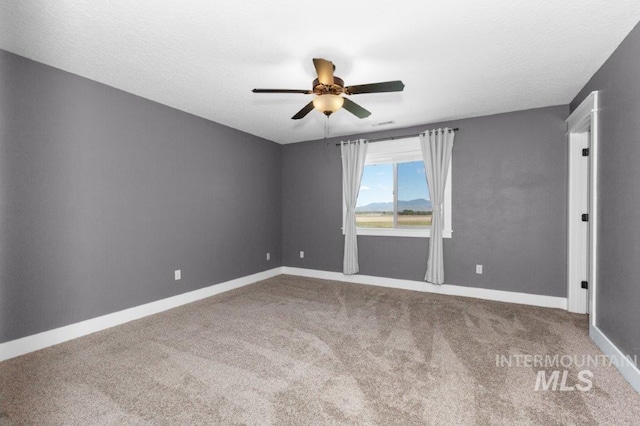 2600 W S Slope Rd, Emmett, ID 83617 - carpeted empty room featuring ceiling fan and baseboards