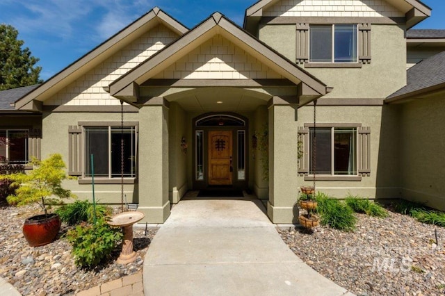 2600 W S Slope Rd, Emmett, ID 83617 - doorway to property with stucco siding