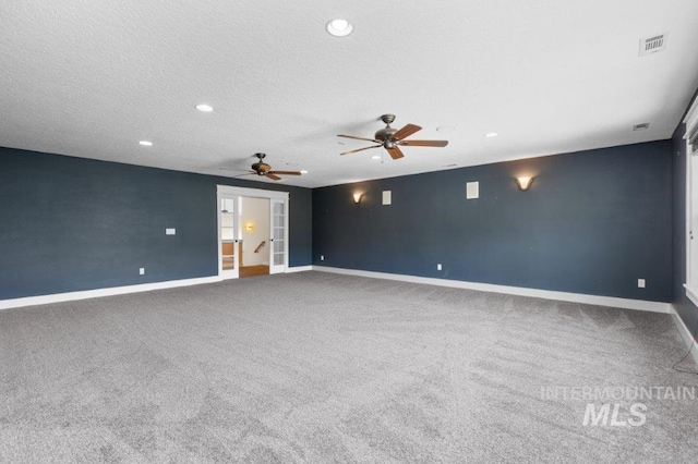 2600 W S Slope Rd, Emmett, ID 83617 - unfurnished room with carpet, baseboards, a ceiling fan, and recessed lighting