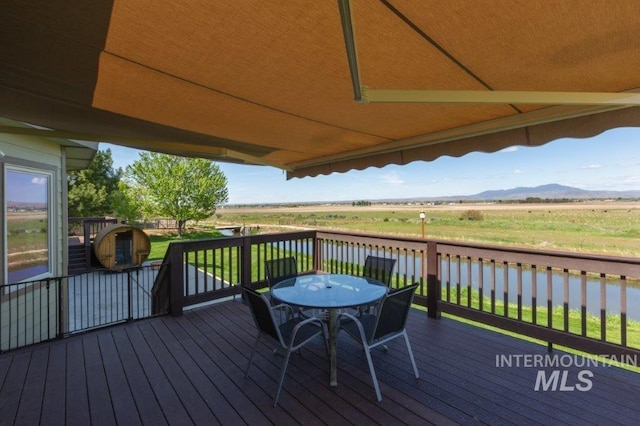 2600 W S Slope Rd, Emmett, ID 83617 - deck with a water and mountain view and outdoor dining space