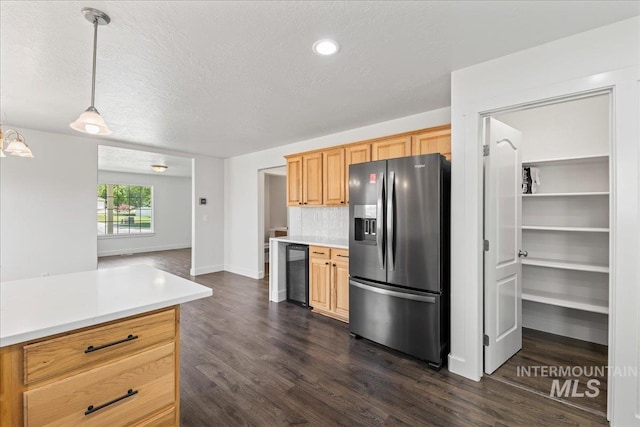 6311 S Solar Way, Boise, ID 83709 - kitchen featuring stainless steel fridge with ice dispenser, beverage cooler, light countertops, dark wood-style flooring, and a textured ceiling