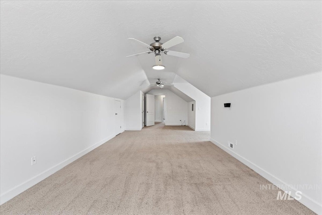 6311 S Solar Way, Boise, ID 83709 - bonus room featuring ceiling fan, carpet floors, baseboards, and lofted ceiling