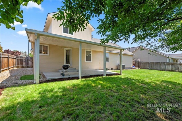 6311 S Solar Way, Boise, ID 83709 - back of house with central air condition unit and a patio