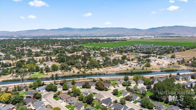 6311 S Solar Way, Boise, ID 83709 - aerial view of residential area with a water and mountain view