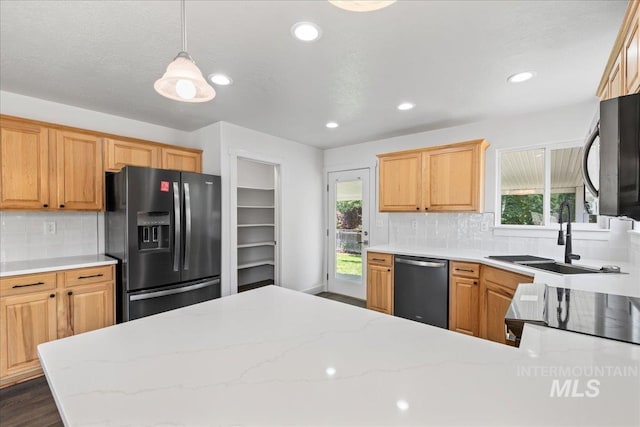 6311 S Solar Way, Boise, ID 83709 - kitchen with appliances with stainless steel finishes, a sink, decorative backsplash, recessed lighting, and dark wood-style flooring