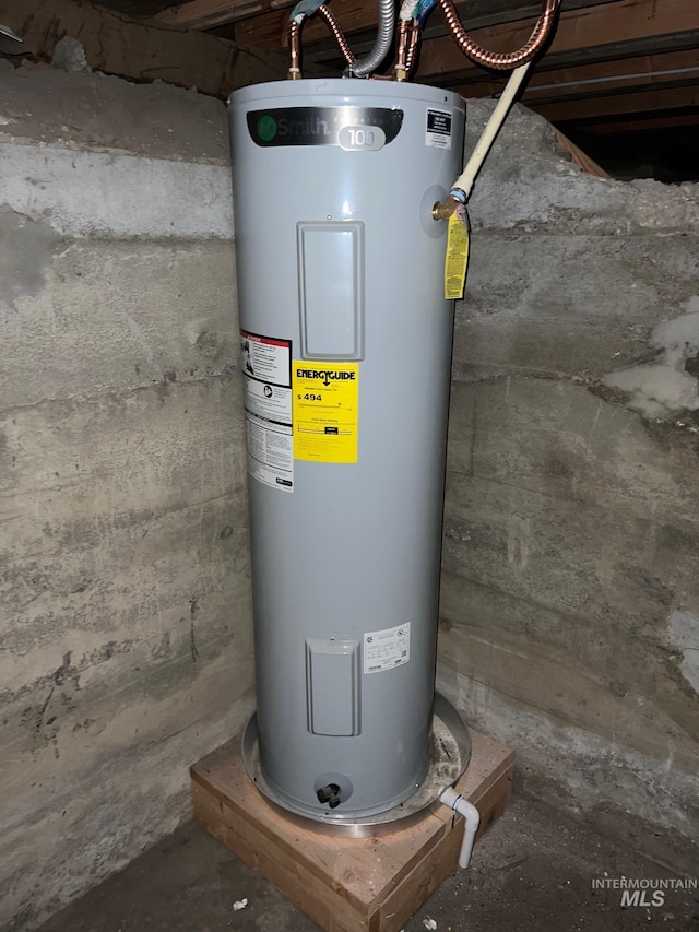 utility room featuring electric water heater