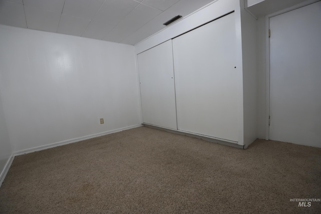 interior space with carpet and a closet