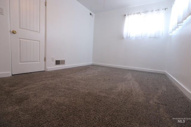spare room with carpet