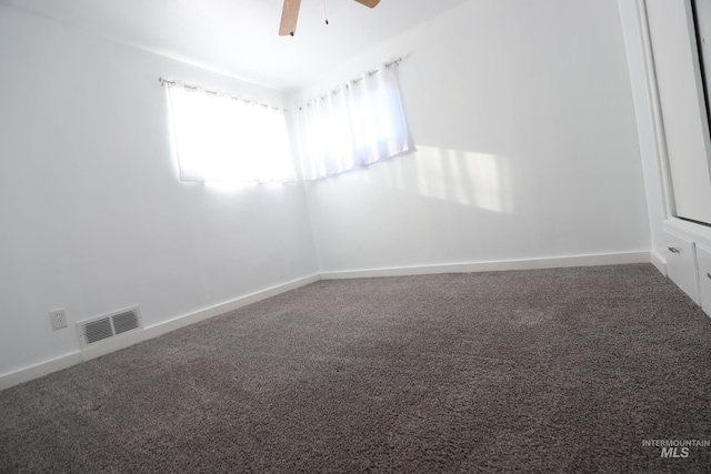 unfurnished room featuring carpet flooring and ceiling fan
