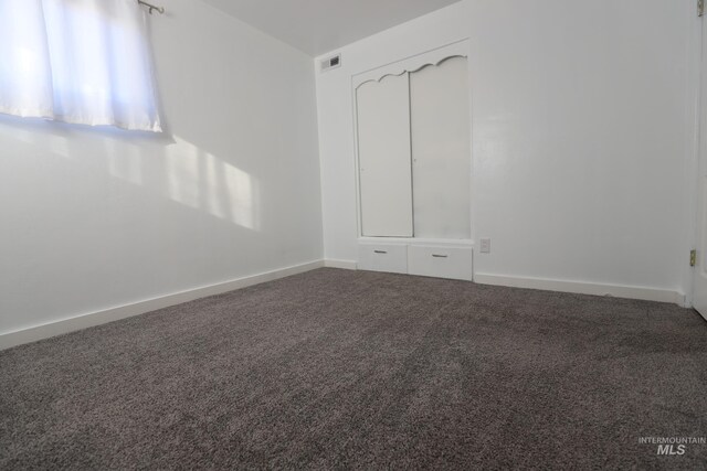 empty room featuring carpet