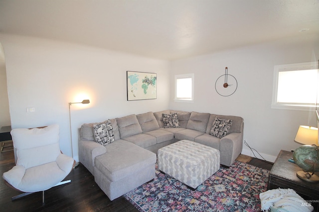 living room featuring dark wood-type flooring