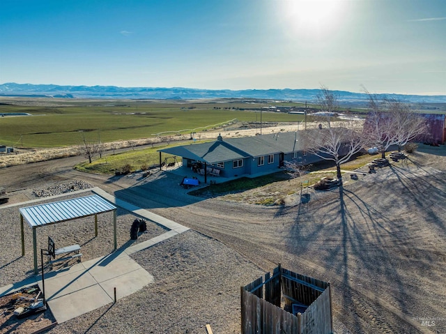 bird's eye view with a mountain view and a rural view