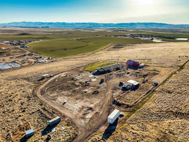 aerial view featuring a rural view and a mountain view