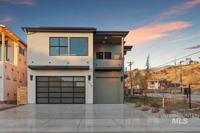 contemporary house featuring a garage