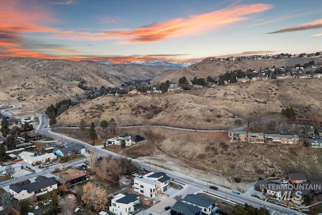 aerial view at dusk with a mountain view