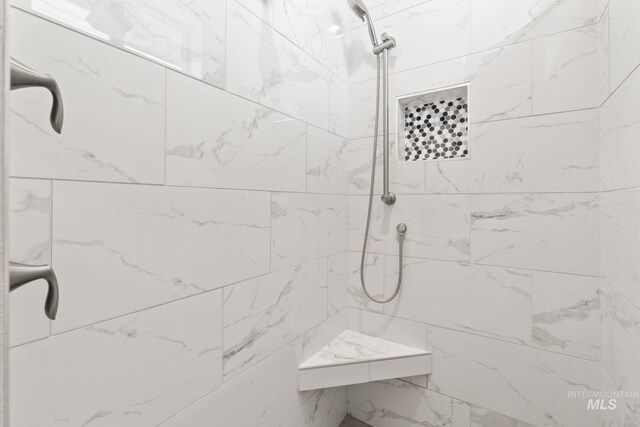 1073 W Smoky Quartz St, Kuna, ID 83634 - bathroom featuring a tile shower