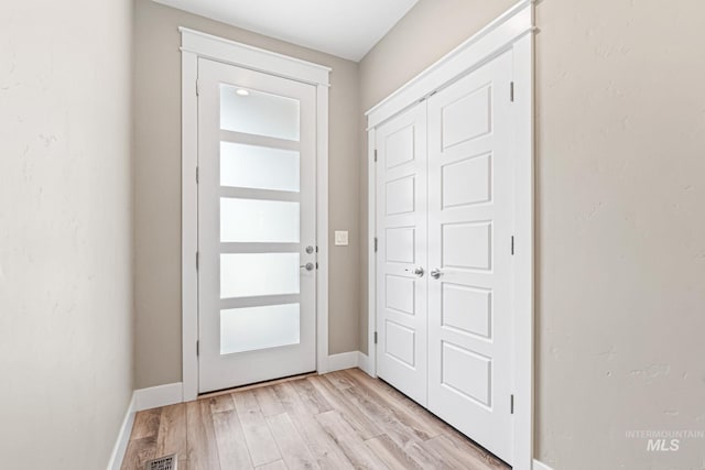 1073 W Smoky Quartz St, Kuna, ID 83634 - entryway with light wood finished floors and baseboards