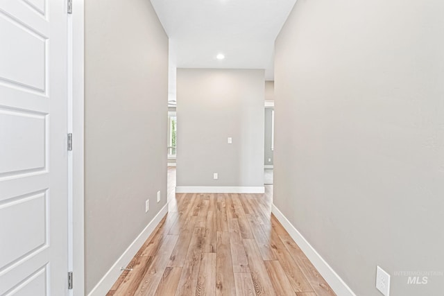 1073 W Smoky Quartz St, Kuna, ID 83634 - hall with light wood finished floors, baseboards, and recessed lighting