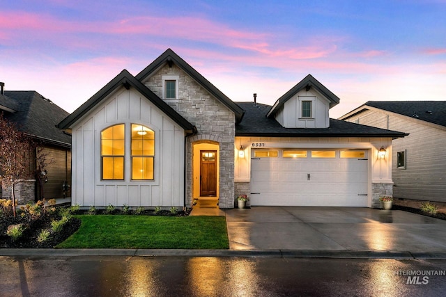 6251 S Utmost Ln, Meridian, ID 83642 - french country inspired facade with stone siding, board and batten siding, an attached garage, driveway, and a front yard