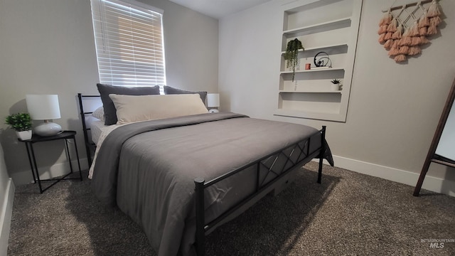 1101 Clithero Dr, Boise, ID 83703 - bedroom featuring dark carpet and baseboards