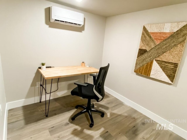 1101 Clithero Dr, Boise, ID 83703 - office area featuring wood finished floors, baseboards, and an AC wall unit