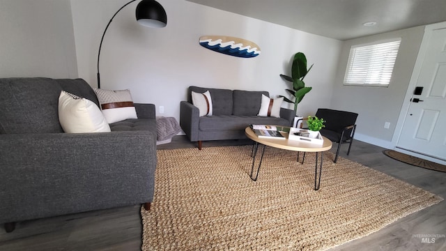 1101 Clithero Dr, Boise, ID 83703 - living room with baseboards and dark wood finished floors