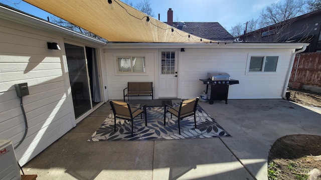 1101 Clithero Dr, Boise, ID 83703 - view of patio / terrace with fence, outdoor dining area, and area for grilling