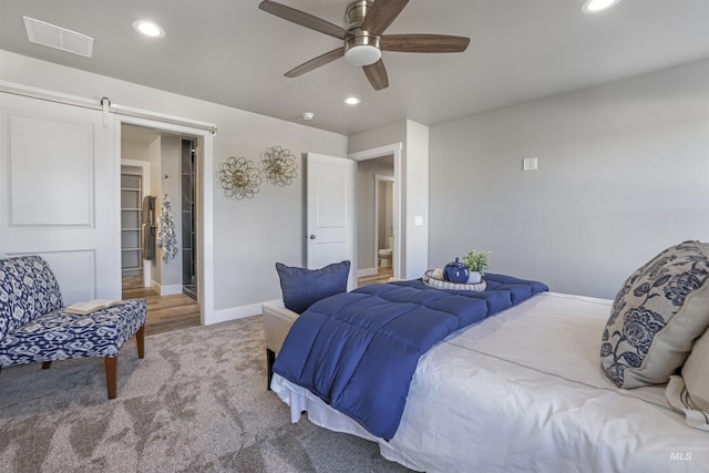 507 Jesse Ave, Twin Falls, ID 83301 - carpeted bedroom with recessed lighting, baseboards, a barn door, and a ceiling fan