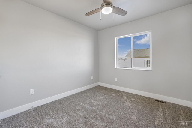 507 Jesse Ave, Twin Falls, ID 83301 - spare room with carpet flooring, a ceiling fan, and baseboards