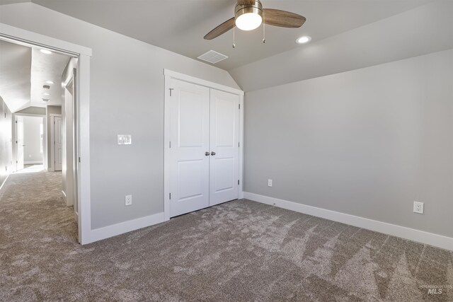 507 Jesse Ave, Twin Falls, ID 83301 - unfurnished bedroom with vaulted ceiling, carpet floors, baseboards, a closet, and recessed lighting