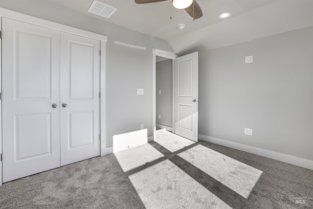 507 Jesse Ave, Twin Falls, ID 83301 - unfurnished bedroom with carpet, vaulted ceiling, a closet, baseboards, and a ceiling fan