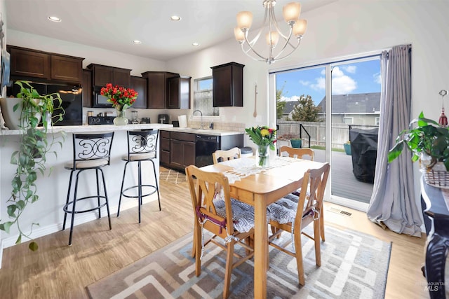449 View Ave, Twin Falls, ID 83301 - dining space with light wood-type flooring, a chandelier, and recessed lighting