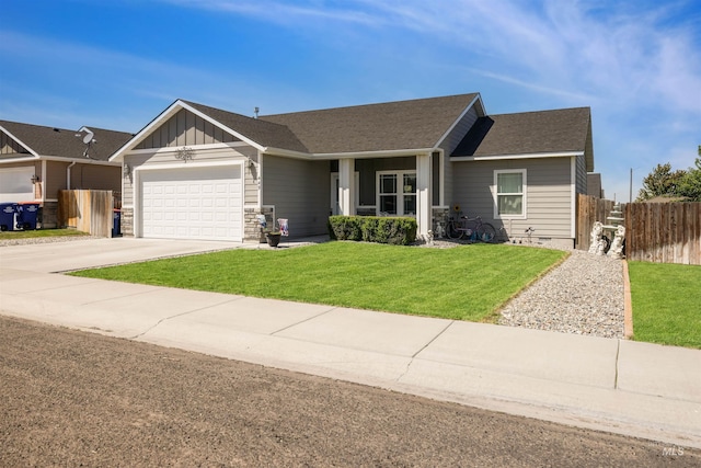 449 View Ave, Twin Falls, ID 83301 - view of front of home featuring board and batten siding, a garage, and driveway