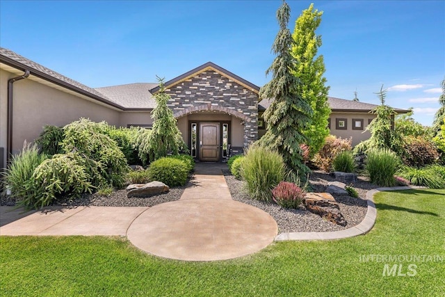 1548 Creek Stone Cir, Twin Falls, ID 83301 - view of front of home with stucco siding and a front lawn