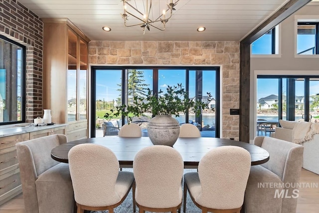 dining space with a notable chandelier and recessed lighting
