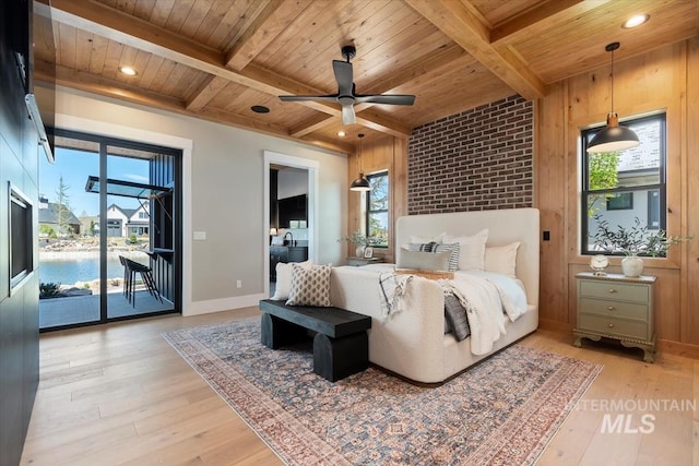 bedroom with wood ceiling, access to outside, multiple windows, and light wood-style flooring