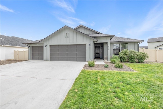 view of front of home with an attached garage, board and batten siding, driveway, and a shingled roof