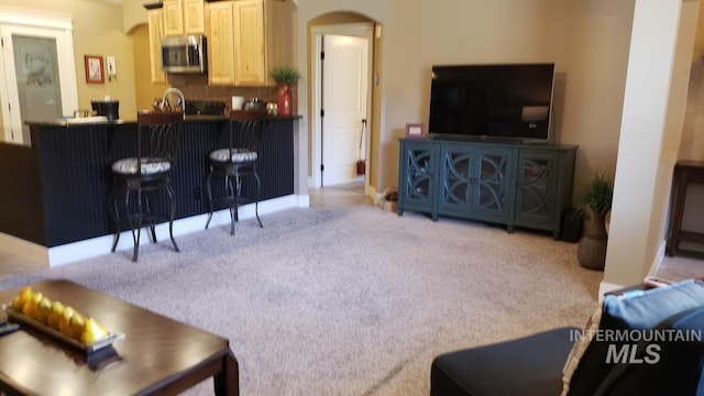 1719 E Horse Creek Ct, Meridian, ID 83642 - living room with arched walkways and carpet