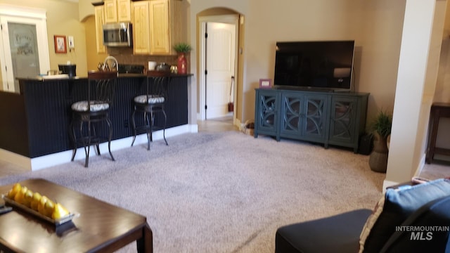 1719 E Horse Creek Ct, Meridian, ID 83642 - living room with arched walkways and carpet