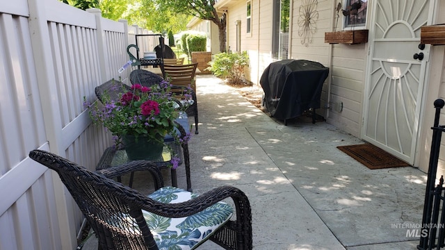 1719 E Horse Creek Ct, Meridian, ID 83642 - view of patio with a grill