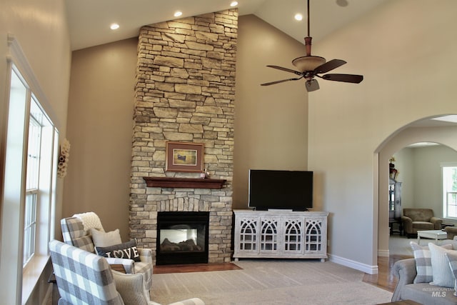 3703 E 3793 N, Kimberly, ID 83341 - living room featuring high vaulted ceiling, arched walkways, a ceiling fan, a fireplace, and recessed lighting